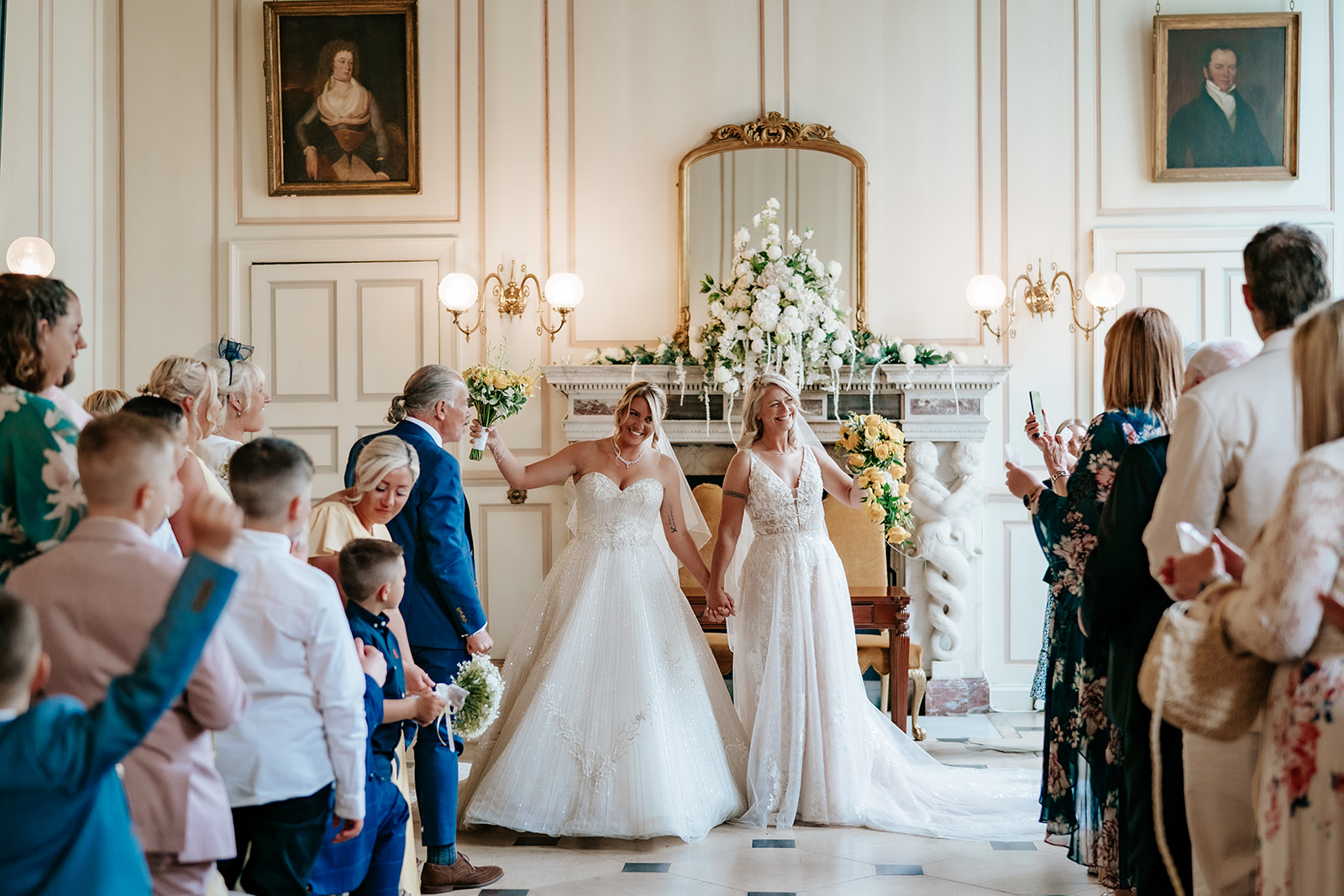 A married couple just married in the grand salon at gosfield hall