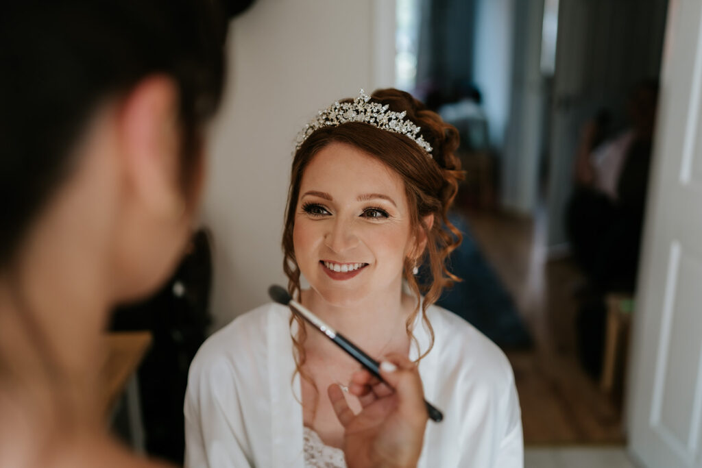 bride getting ready at home for her manor of all events wedding in suffolk